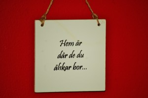 Translation:  "Home is where your love lives" — picked this up in Sweden